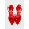 Red patent leather pumps