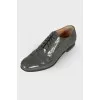 Dark green lacquer brogues