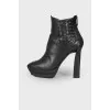 High-heeled leather ankle boots