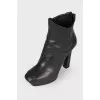 High-heeled leather ankle boots