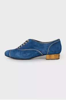 Gold and blue shoes lace-up closure