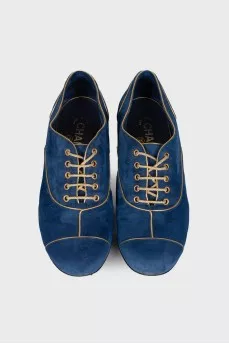 Gold and blue shoes lace-up closure