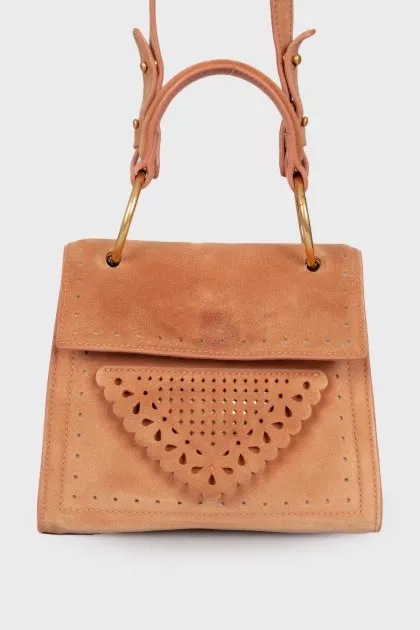 Perforated suede bag
