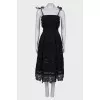 Lace dress with ties at the shoulders