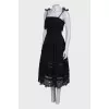 Lace dress with ties at the shoulders