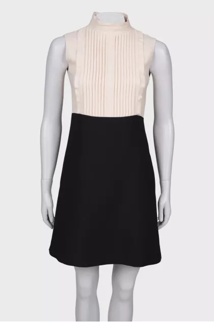 Black and beige pleated dress