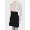 Black and beige pleated dress