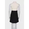 Black and beige pleated dress