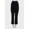 Black corduroy trousers