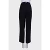 Black corduroy trousers
