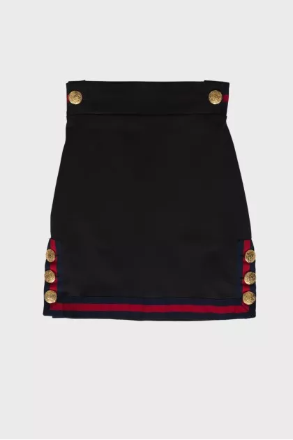 Black skirt with golden buttons