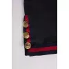 Black skirt with golden buttons