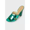 Lacquered sandals with curly heels