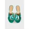 Lacquered sandals with curly heels