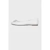 White ballerinas with a bow