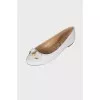 White ballerinas with a bow