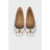 White ballerinas with a bow