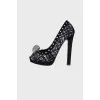 Skull tweed pumps