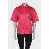 Satin blouse with tag
