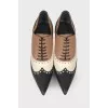 Perforated leather ankle boots
