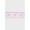 Pink belt with press-studs closure