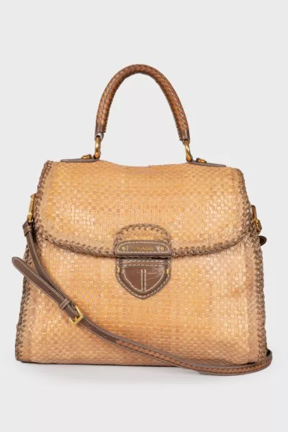 Woven bag with brand logo