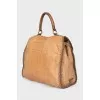 Woven bag with brand logo