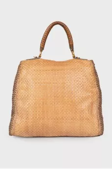 Woven bag with brand logo
