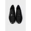 Low-heeled patent leather shoes