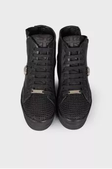 Black boots decorated with rhinestones
