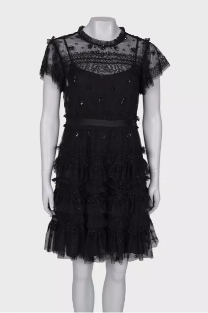 Dress with ruffles and beaded embroidery