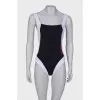 Black and white swimsuit with tag