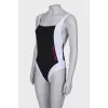 Black and white swimsuit with tag