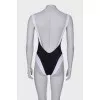 Black and white swimsuit with tag