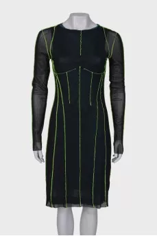 Dress with a decorated seam