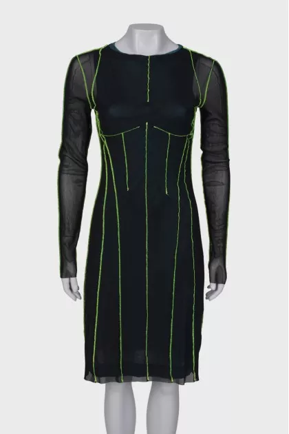 Dress with a decorated seam