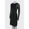 Dress with a decorated seam