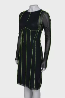 Dress with a decorated seam