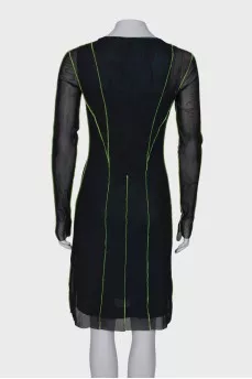 Dress with a decorated seam
