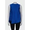 Blue sleeveless blouse with tag