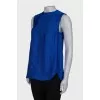 Blue sleeveless blouse with tag
