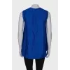 Blue sleeveless blouse with tag