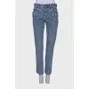 Blue jeans decorated with rhinestones