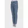 Blue jeans decorated with rhinestones