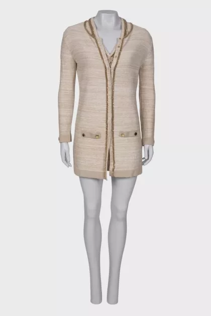 Beige suit with gold hardware