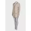 Beige suit with gold hardware