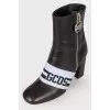 Leather ankle boots with brand logo