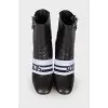Leather ankle boots with brand logo