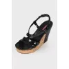 Lacquered wedge sandals