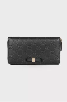 Leather wallet in signature print